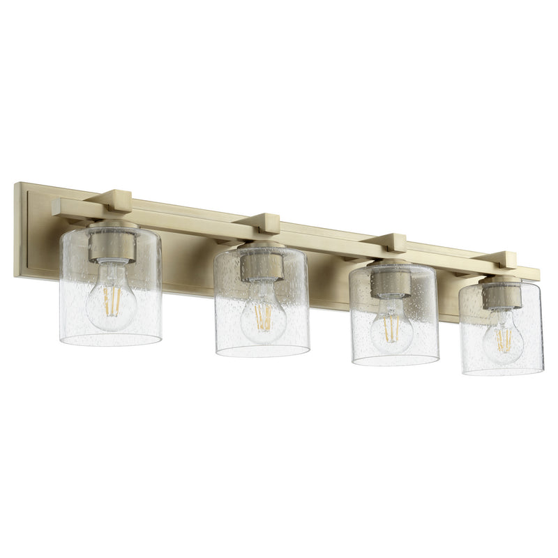 Quorum 5369-4-280 Four Light Vanity, Aged Brass w/ Clear/Seeded Finish - LightingWellCo