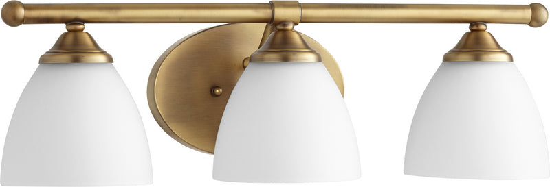 Quorum 5150-3-80 Three Light Vanity, Aged Brass w/ Satin Opal Finish - LightingWellCo